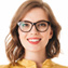 smiling-lady-in-eyeglasses-and-dress-standing-with-SBAK95C.jpg